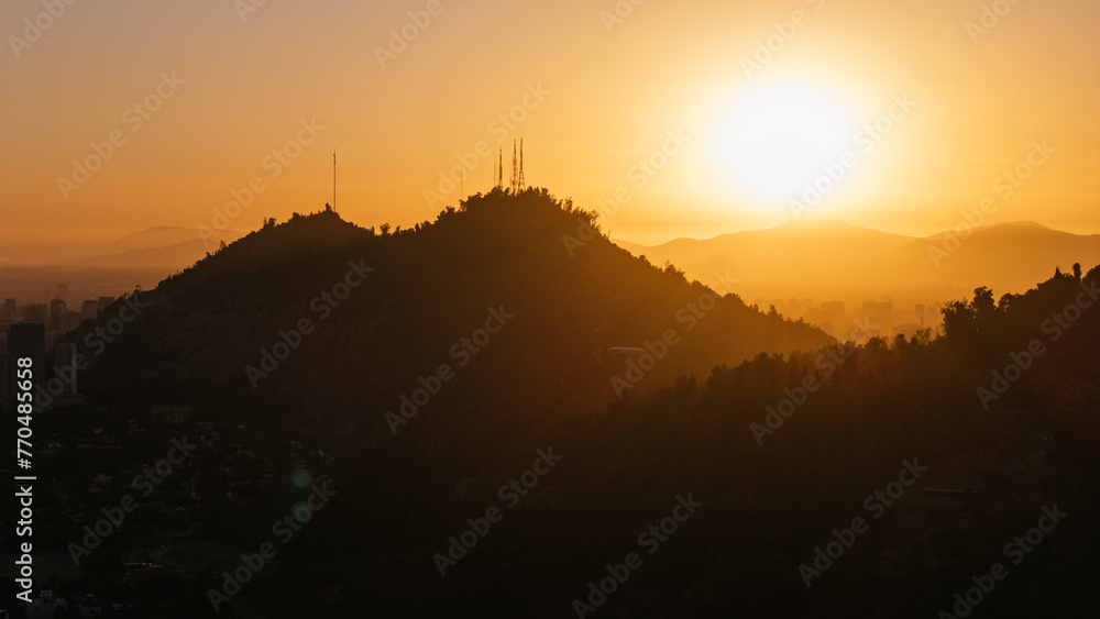 Aerial view of a sunset over rolling hills in Santiago, Chile