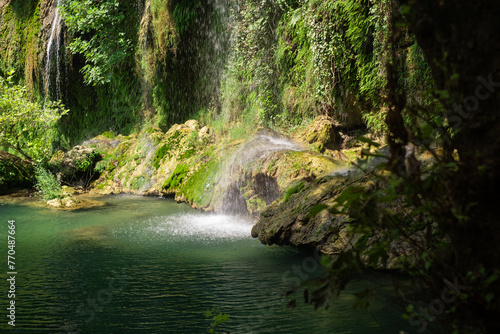 Discover nature s wonders  a waterfall in lush green park. Ideal for eco-tourism  hiking excursions  and exploring natural reserves and landmarks.