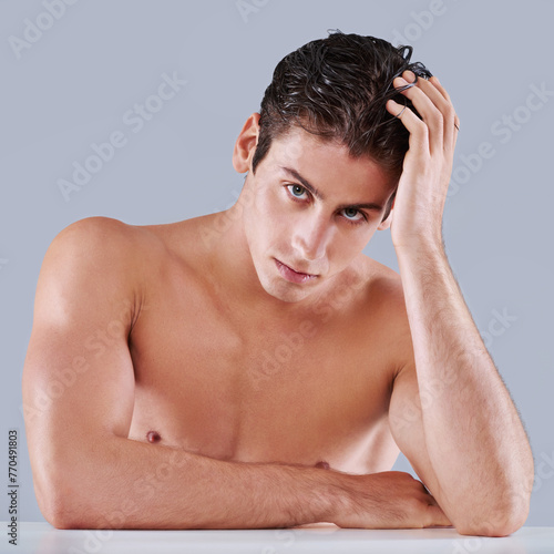 Man, portrait and skincare health in studio or facial treatment with dermatology, wellness or grey background. Male person, face and model with hand on mockup space for wellbeing, hygiene or pride