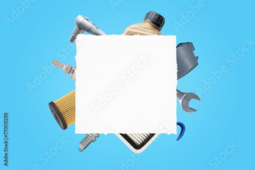 Blank white paper surrounded by car parts and tools. Ideal for car service logo promotion. Template for showcasing text. Top view, flat lay composition