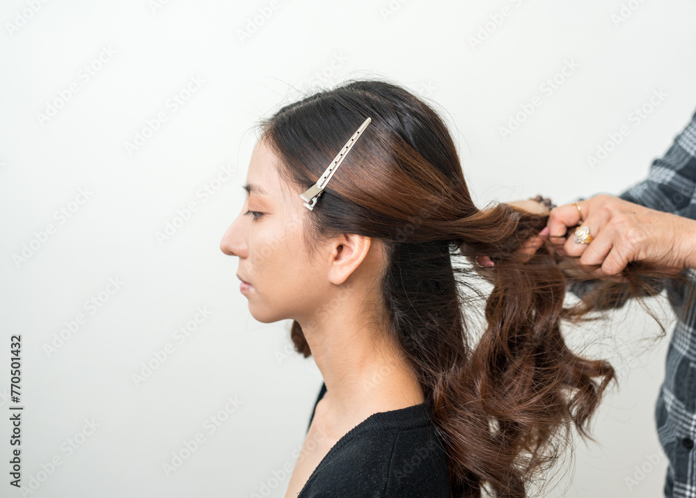 Beautiful young asian bride with wedding makeup and hairstyle before ceremony. Preparation for wedding applying with cosmetic by artist makeup. Beautiful young asian bride with wedding makeup and hairstyle before ceremony. Preparation for wedding applying with cosmetic by artist makeup.