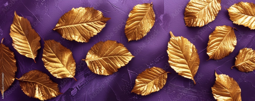 Golden leaves on a purple background Golden leaves on a purple background
