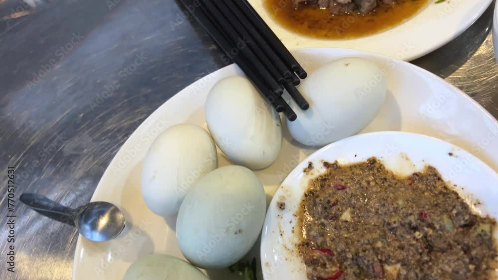 Egg with embryo Vietnamese delicacy. Balut boiled developing duck ...