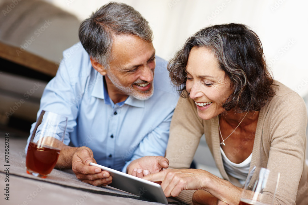 Senior couple on the floor, home and love with tablet, relaxing and bonding together with internet and social media. Apartment, old woman and mature elderly on the ground, technology and website info Senior couple on the floor, home and love with tablet, relaxing and bonding together with internet and social media. Apartment, old woman and mature elderly on the ground, technology and website info
