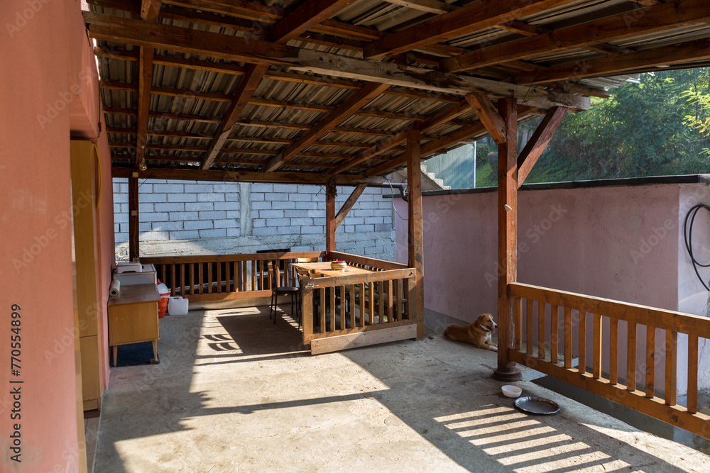 Fototapeta premium very nice wooden outdoor yard with a dog take care