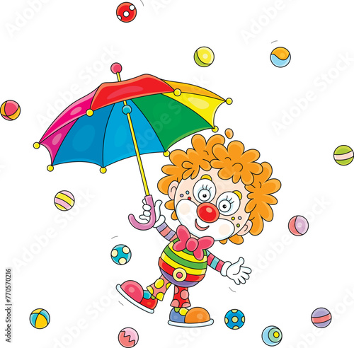 Funny red curly-headed circus clown playing with a multi colored striped umbrella and colorful toy balls in a fun performance, vector cartoon illustration on a white background