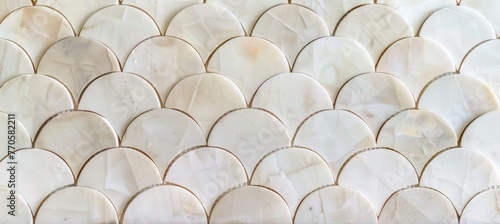 Close up of white marble mosaic tile pattern with arched shapes. Abstract background, texture and wallpaper for interior design in bathroom or kitchen