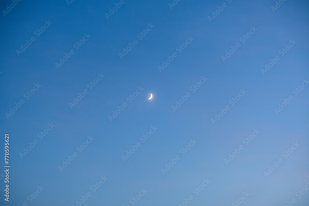 waxing crescent moon on the blue sky waxing crescent moon on the blue sky