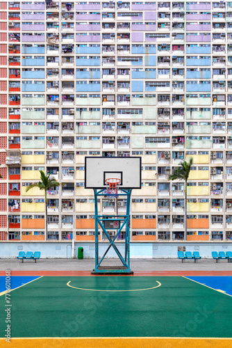 Colorful rainbow pastel building with basketball court and facade windows background in public park. Architecture building design in Choi Hung Estate, Kowloon, Hong Kong City, China. © Sven Taubert