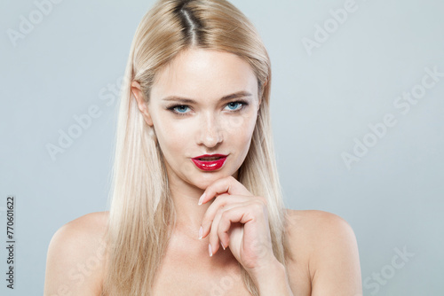 Posing blonde model woman portrait. Facial treatment, cosmetology, skin care concept