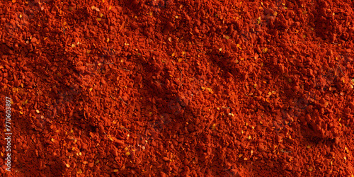 Red marble texture chili pepper powder Pile of goji on red background photo
