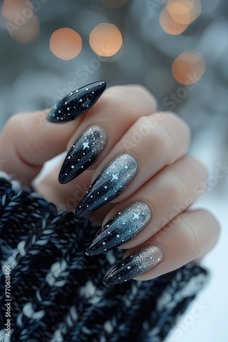 Nail art with zodiac signs, lovely stars, and sparkling designs. 
