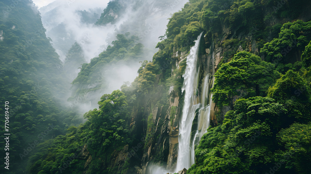 A majestic waterfall cascading down a rugged cliff surrounded by lush greenery. - obrazy, fototapety, plakaty 