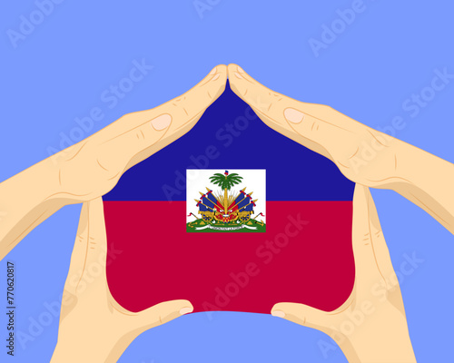 Hand home with Haiti flag, residential or investment idea, housing and home concept