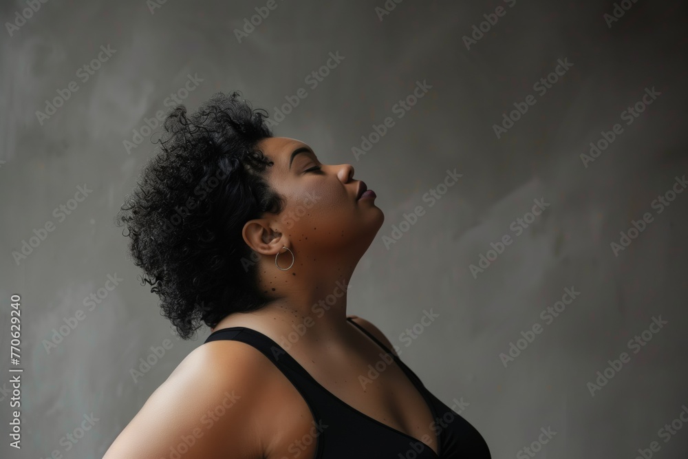 profile of a plussize dancer in a classic ballet stance profile of a plussize dancer in a classic ballet stance
