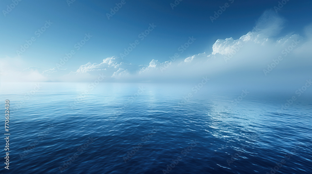 Fototapeta premium calm sea with soft waves and a horizon flush with a clear sky and diluted with clouds