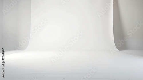 A pure white background in a photo studio setting.