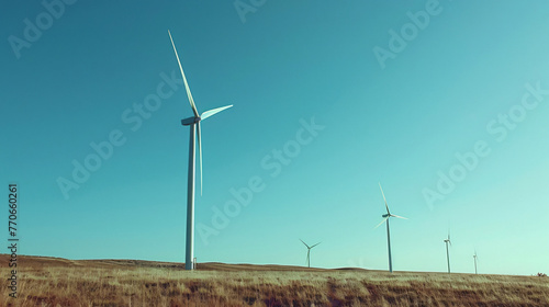 A modern wind farm set against a clear blue sky turbines spinning in harmony with nature.