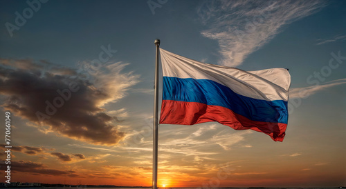 Russian flag on the background of sunset