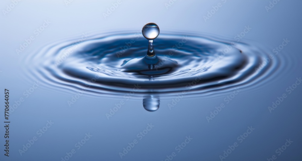 A drop of water is falling into a large body of water A drop of water is falling into a large body of water