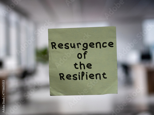 Post note on glass with 'Resurgence of the Resilient'.