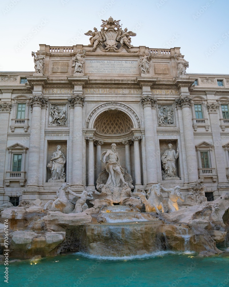 Beautiful low angle shot of the trevi fountain under a clear blue sky