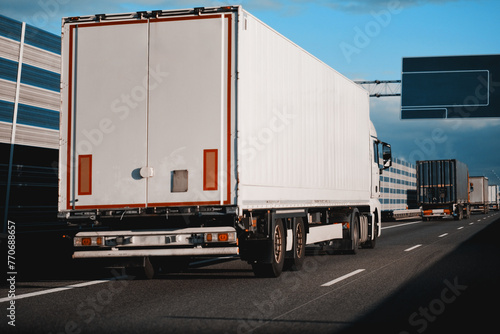 Cargo Truck On The Road In High-Speed Motion. International Logistics Shipping Delivery Concept. Speed Restriction Control Violation 