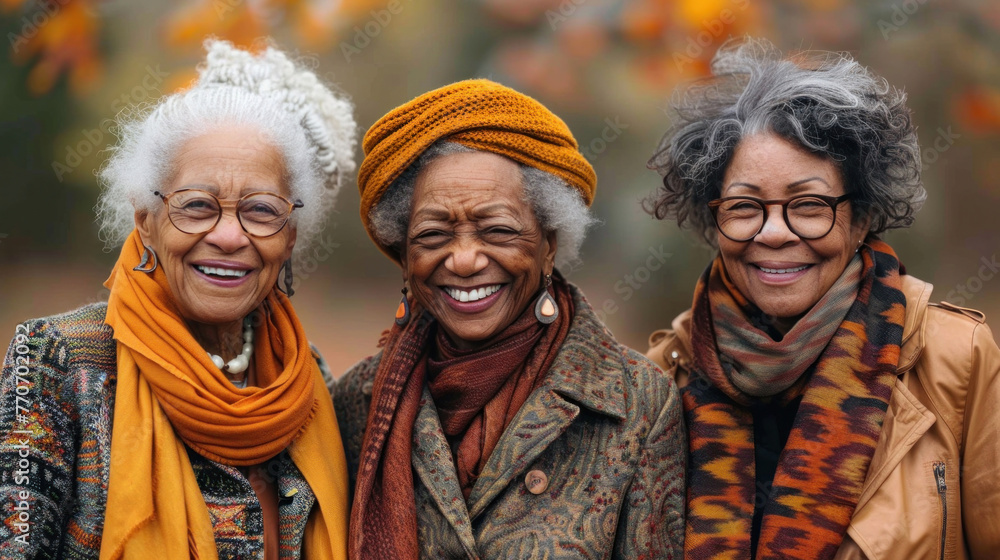 Cheerful, bright, fashionably dressed old women meet them together, communicate and laugh. Cheerful grandmothers. International Day of Older Persons. World Grandparents Day. Copy space