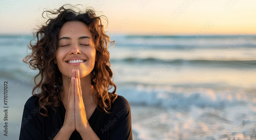 Portrait of a happy woman practicing yoga on the beach Portrait of a happy woman practicing yoga on the beach
