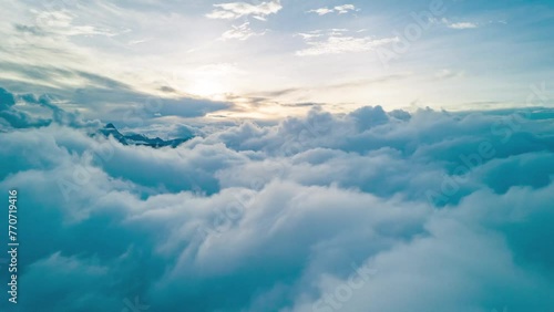 Timelapse of the clouds floating in the air with the sunset in the background in China