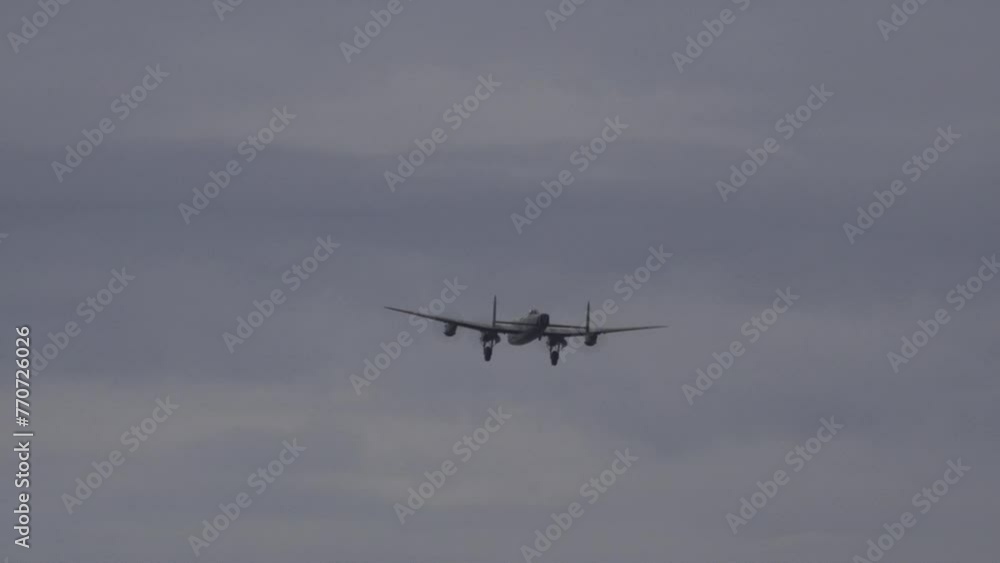 Avro Lancaster bomber world war 2 plane spitfire and Hawker Hunter in formation in the sky. Flying close to camera England UK 4K Avro Lancaster bomber world war 2 plane spitfire and Hawker Hunter in formation in the sky. Flying close to camera England UK 4K