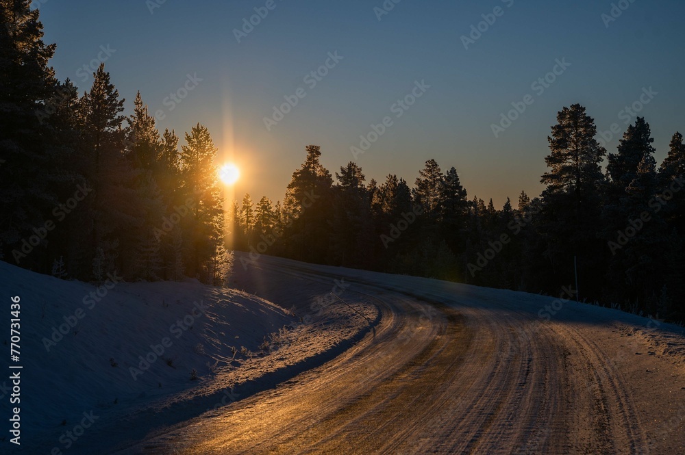 Majestic winter scene of a snow-covered landscape illuminated by a spectacular sunset sky. Majestic winter scene of a snow-covered landscape illuminated by a spectacular sunset sky.