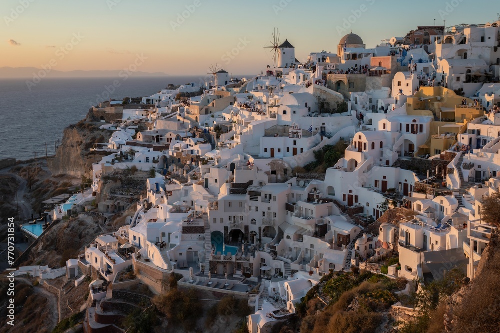 Fototapeta premium View of Santorini, Greece, showcasing the picturesque, white-washed buildings