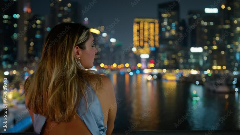 Blonde Woman Admiring The Beauty Of Dubai Architecture Blonde Woman Admiring The Beauty Of Dubai Architecture