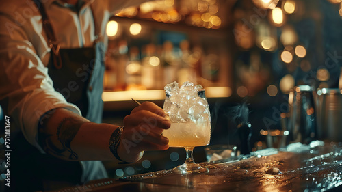 close up of a barman doing cocktail in the bar  barman in the pub  close up o a cocktail on the table