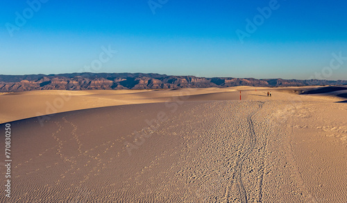 Hiking the Alkali Flats Trail at White Sands National Park.