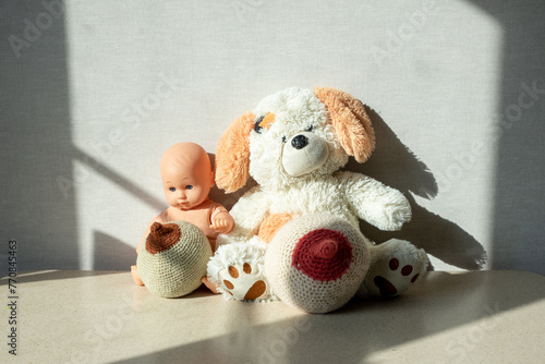 consultant on breastfeeding, lactation, female breast baby doll dog wool