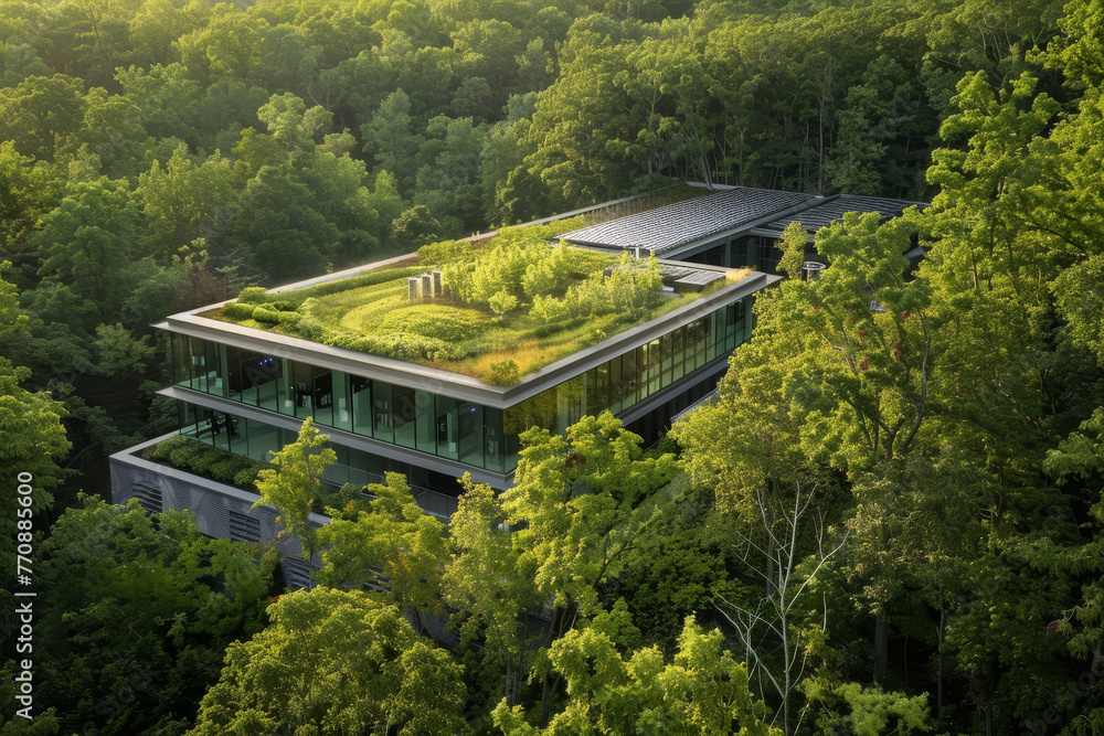 A large building with a green roof and a lot of trees surrounding it A large building with a green roof and a lot of trees surrounding it