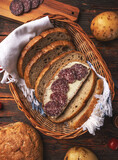 Bread with butter and sliced salami