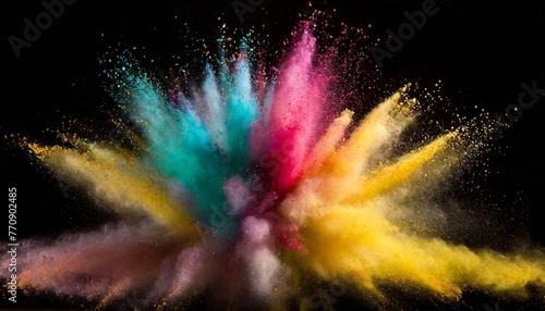 Explosion of colored powder on black background photo