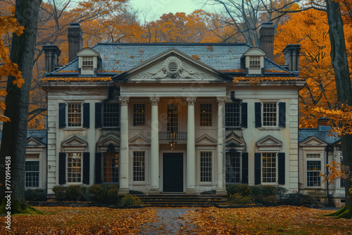 A large colonialstyle house with symmetrical columns and gatable windows, surrounded by autumn leaves. Created with Ai photo
