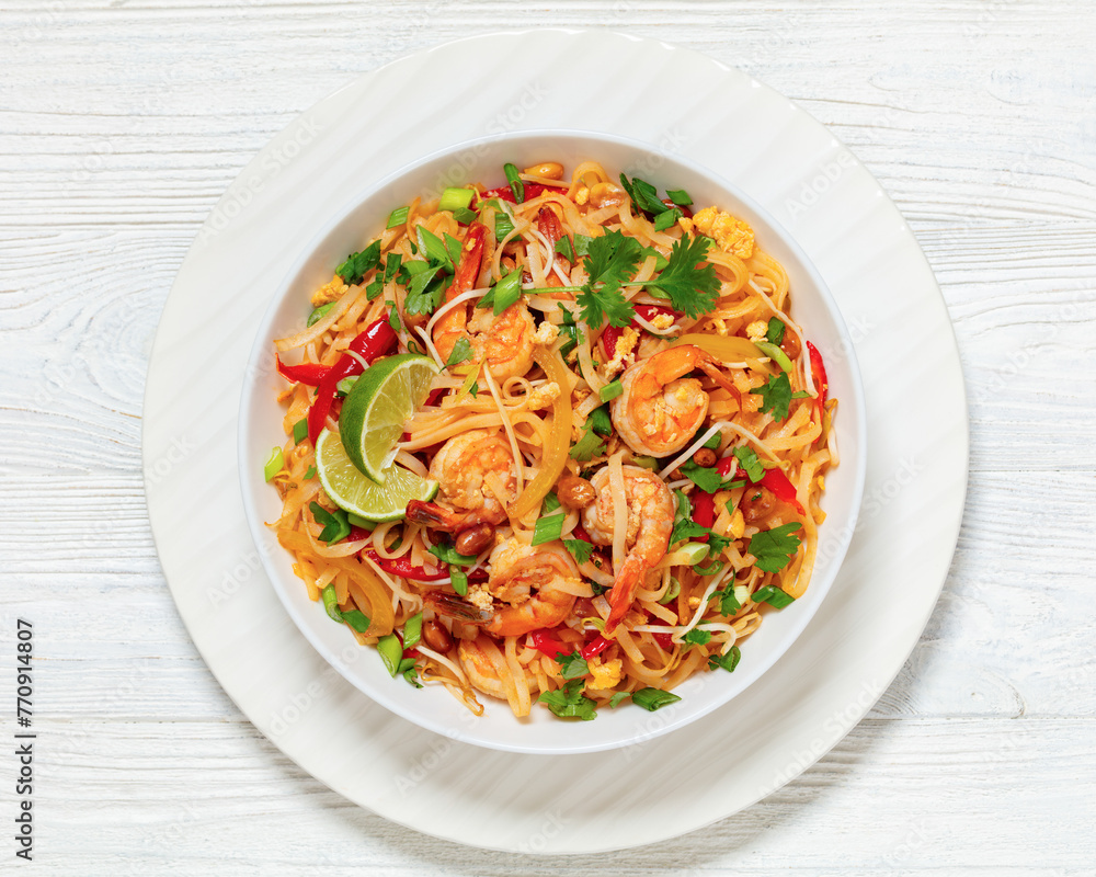 pad thai with shrimps, peanuts, eggs, bean sprouts pad thai with shrimps, peanuts, eggs, bean sprouts