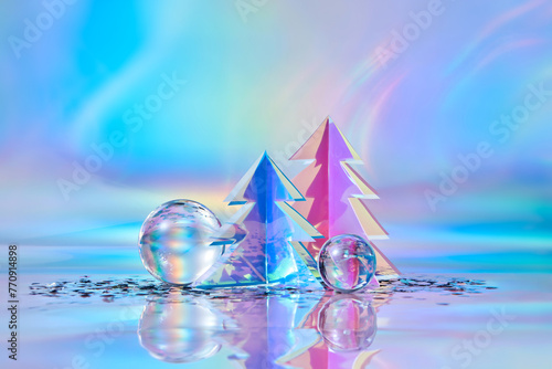 Glass baubles, confetti and Christmas trees made of holographic foil photo