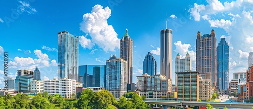 Downtown Atlanta Skyline showing several prominent buildings and hotels under a blue sky