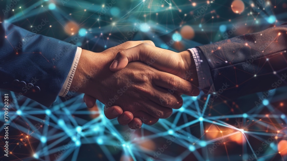 Fototapeta premium Two men shake hands in front of a computer screen with a lot of lines and dots. Concept of professionalism and trust between the two men