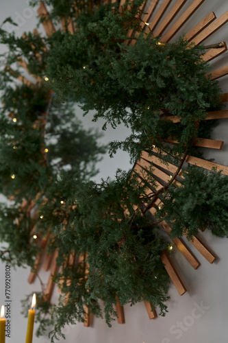 the mirror decorated with spruce branches photo