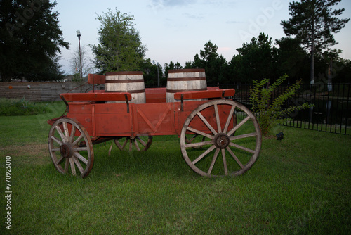old carriage with barrels in the countryside