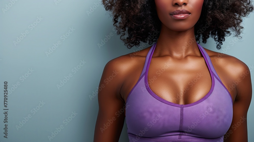 Woman Afro American fitness model in top with well defined abdominal muscles Woman Afro American fitness model in top with well defined abdominal muscles