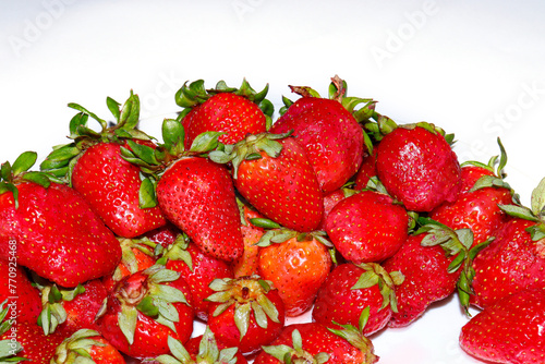 strawberries on a white background, Fresh strawberries on an isolated white background, strawberry close up © Muzzammil