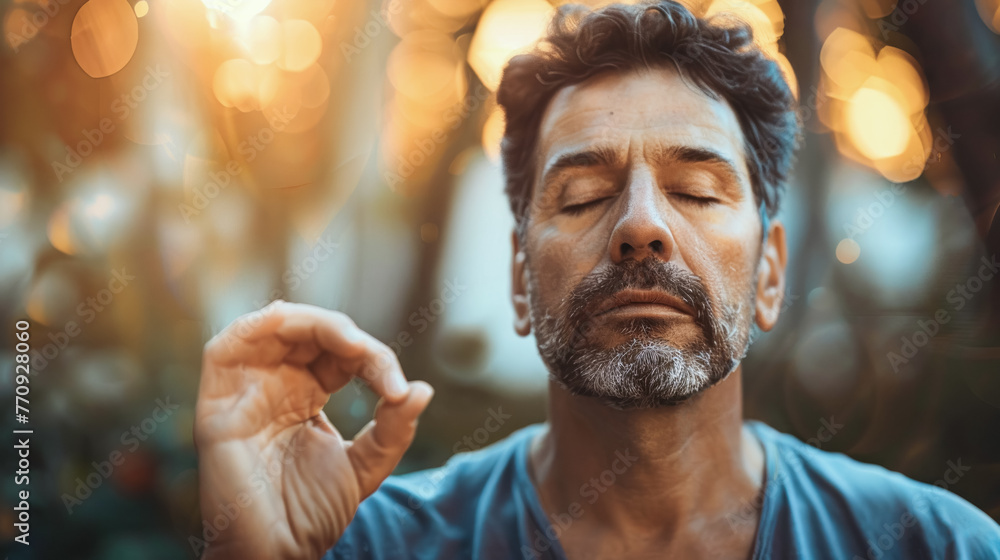 A mature man practices meditation in the garden at sunset, connecting with nature and himself in peaceful solitude A mature man practices meditation in the garden at sunset, connecting with nature and himself in peaceful solitude